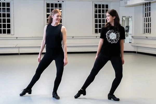 Two dancers practicing Irish dance