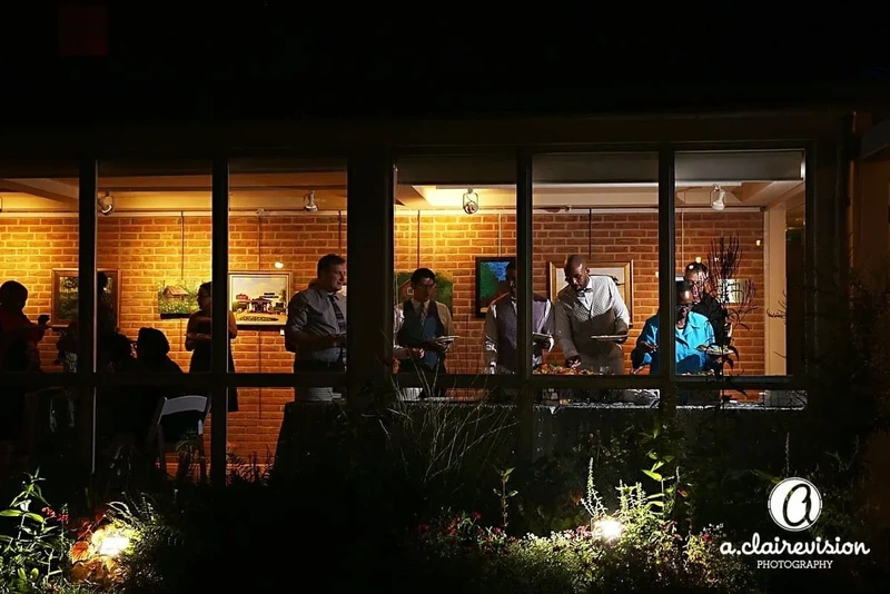 Guests gathered during an evening wedding event