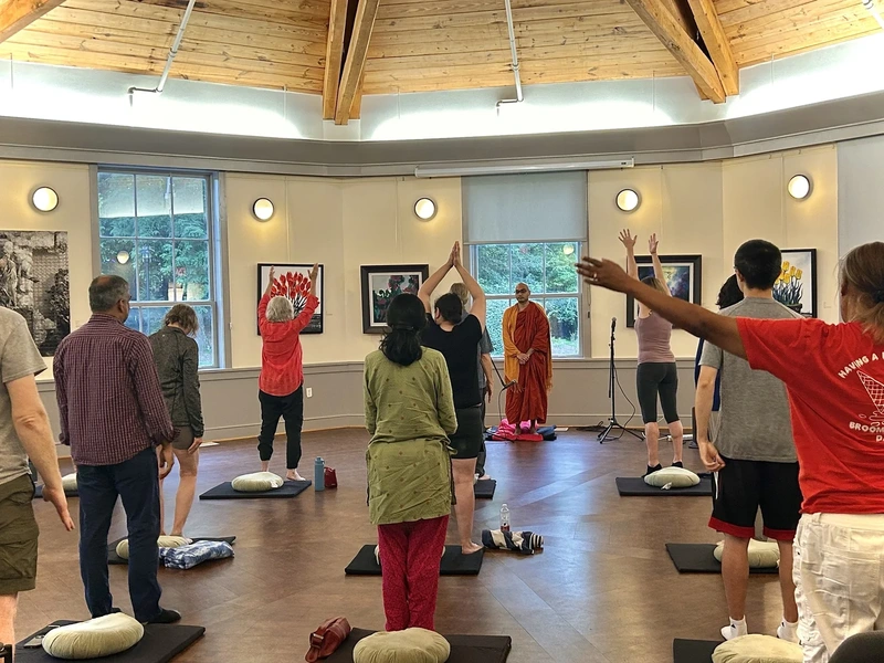A Buddhist monk leading a meditation session at Sandy Spring Museum